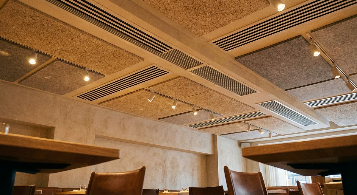 Restaurant ceiling with integrated MEP systems and lighting design by Wasim Decor Muscat